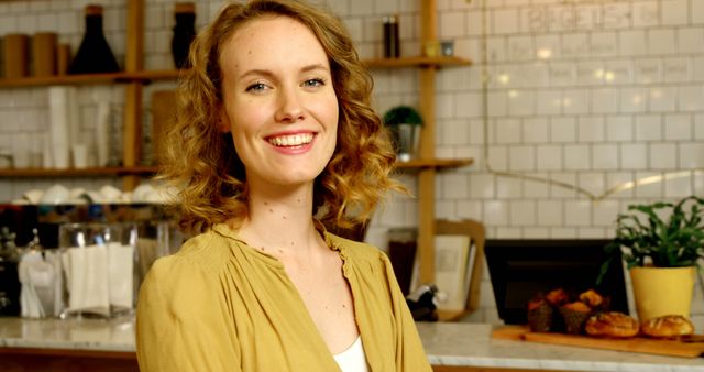 Smiling Woman in Cafe with Light Brown Hair in Yellow Blouse - Download Free Stock Images Pikwizard.com