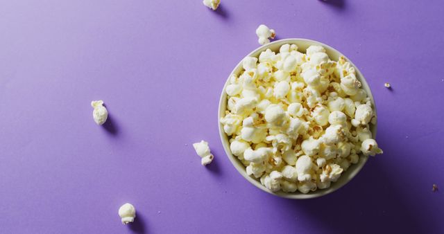 Close Up of Popcorn in Bowl on Purple Background - Download Free Stock Images Pikwizard.com