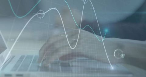 Typing Hands on Laptop with Financial Analytics Overlay and Interactive Line Graphs