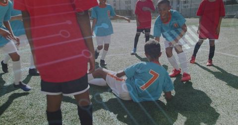 Youth Soccer Players Displaying Teamwork During Intense Match