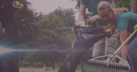 Volunteers Cleaning Park for Environmental Conservation Efforts