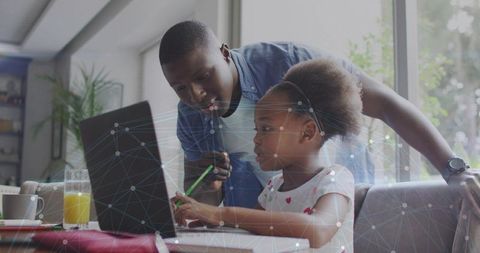 Father guiding daughter on laptop for remote learning with digital network overlay