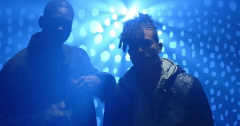 Male Friends in Studio with Atmospheric Blue Lighting