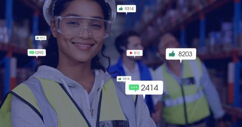 Smiling warehouse worker in hardhat and hi-vis vest with digital engagement overlays