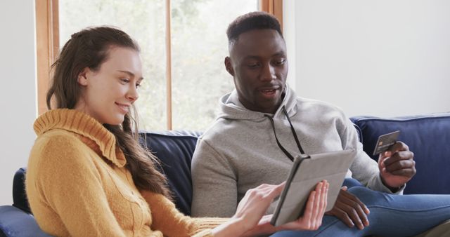 Couple Online Shopping with Tablet in Living Room - Download Free Stock Images Pikwizard.com