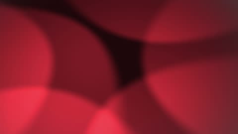 Animated Defocused Red Circles of Light on Dark Background
