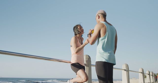 Couple Exercising Together by Seaside - Download Free Stock Images Pikwizard.com