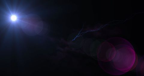 Dramatic Lightning Strikes with Vibrant Lens Flare on Black Background - Download Free Stock Images Pikwizard.com