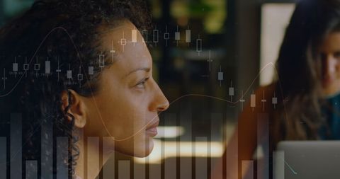 Businesswoman Analyzing Wealth Graphs and Data Integration