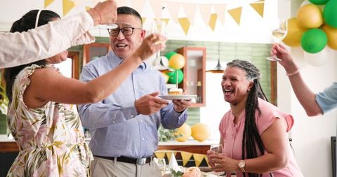 Senior Celebrating Birthday with Friends, Joyful Gathering