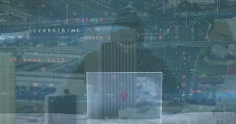 Male Hacker and Cybersecurity Threats Over Urban Cityscape