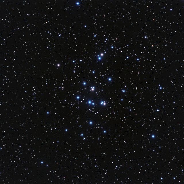 Beehive star cluster, also known as Praesepe, shining with the first known planets Pr0201b and Pr0211b. Ideal for astronomy enthusiasts, educational material on exoplanets, space exploration articles, and night sky observation guides.