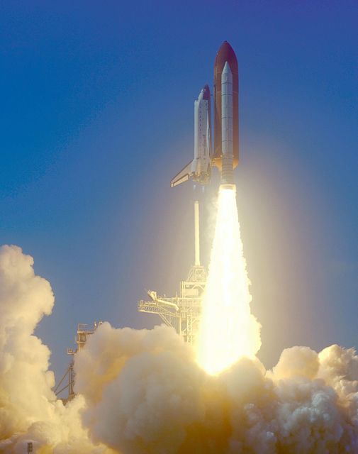 KENNEDY SPACE CENTER, Fla.  --  A rainbow corona of light shimmers behind Space Shuttle Endeavour as a column of flame hurls it into space. Liftoff of the Shuttle on mission STS-99 occurred at 12:43:40 p.m. EST. Known as the Shuttle Radar Topography Mission (SRTM), STS-99 will chart a new course to produce unrivaled 3-D images of the Earth's surface. The result of the SRTM could be close to 1 trillion measurements of the Earth's topography. The mission is expected to last 11days, with Endeavour landing at KSC Tuesday, Feb. 22, at 4:36 p.m. EST. This is the 97th Shuttle flight and 14th for Shuttle Endeavour