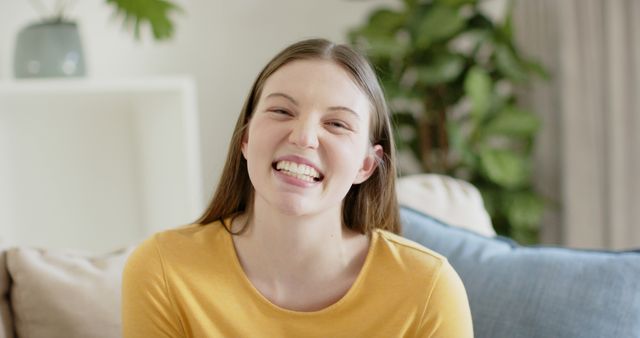 Happy Young Woman Smiling in Bright Indoor Space - Download Free Stock Images Pikwizard.com