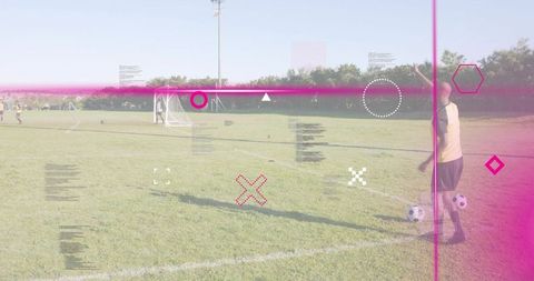 Preparing soccer player kicking ball on grass pitch with magenta overlay, teamwork concept