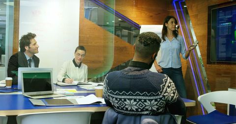 Diverse Team Collaborating in Modern Office Session