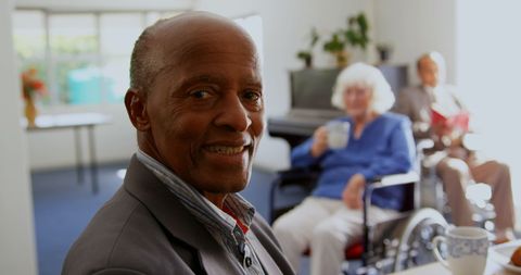African American Senior Man Smiling in Nursing Home - Download Free Stock Images Pikwizard.com