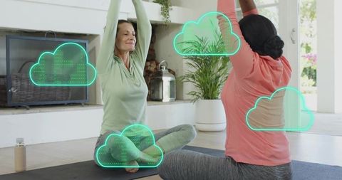 Women stretching on home yoga mats with neon cloud overlays suggesting wellness data