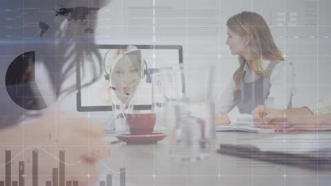 Business Team Collaborating with Financial Data Interfaces