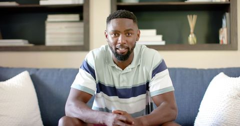 Confident African American Man Enjoying Video Call at Home