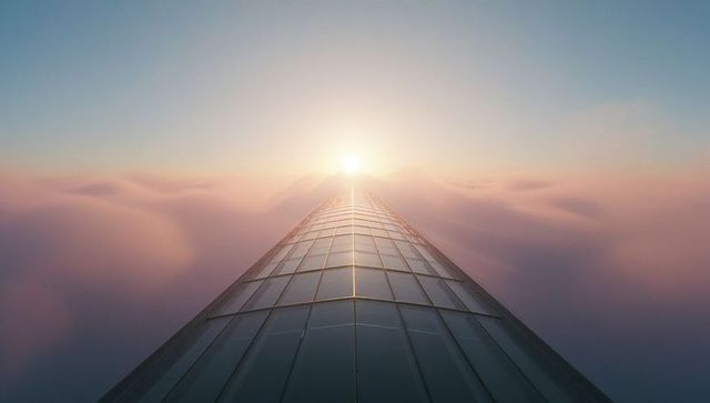 Futuristic Rooftop Glass Panels Reaching Toward Sunrise