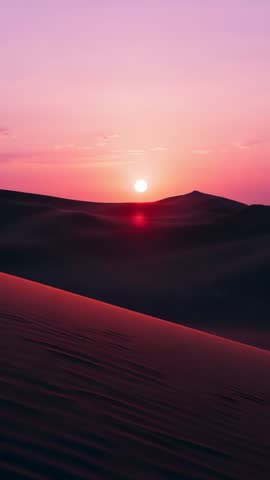 Sun Approaching Horizon Over Desert Dunes Vertical Timelapse with Pink Red Gradient