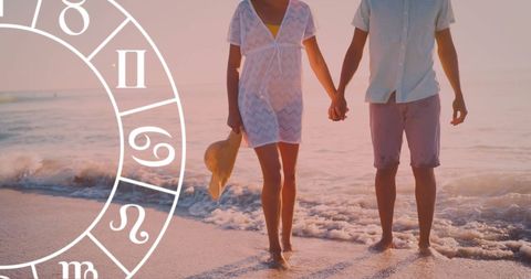 Couple Holding Hands at Beach with Horoscope Symbol Overlay