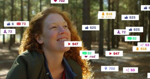Red-haired Woman Smiling in Forest with Social Media Icons
