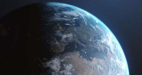 The visual captures Earth's breathtaking satellite view, highlighting night lights that outline continents and oceans. The illuminated cities showcase the human world actively thriving even after dark. This imagery exemplifies the beauty of our planet in the vastness of space at high altitudes. Perfect for use in educational materials related to geography, astronomy lessons, thematic backgrounds in documentaries or environmental discussions highlighting life on Earth.
