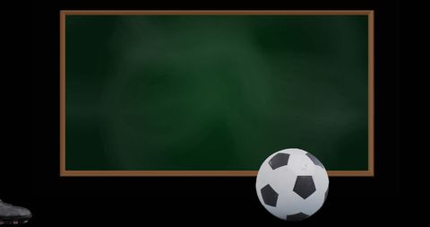 Soccer Ball Near Foot with Chalkboard in Sports Strategy Session