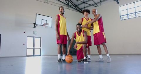 Diverse Basketball Team Celebrating Indoors with Team Spirit - Download Free Stock Images Pikwizard.com