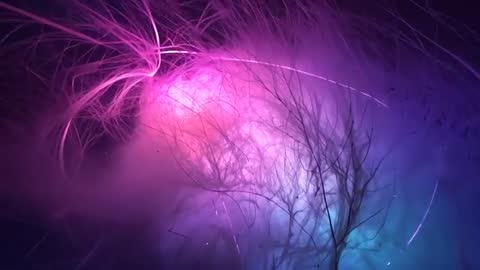 Shifting Luminous Cloud Sending Fibers and Sparks in Magenta and Cyan Neon Mist