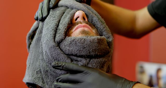 Caucasian man receives a relaxing facial treatment at a spa - Download Free Stock Photos Pikwizard.com