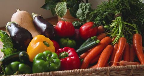 Bountiful harvest of fresh vegetables in wicker basket