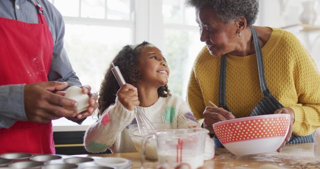 Grandmother and Granddaughter Baking in Kitchen Together - Download Free Stock Images Pikwizard.com