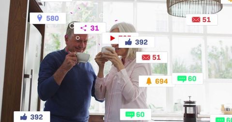 Senior couple enjoying coffee with social media elements