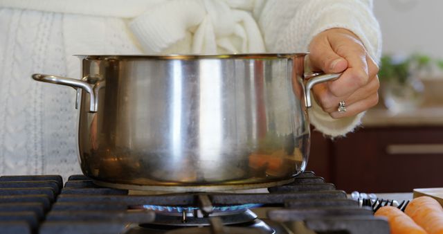 Woman Cooking at Home in Kitchen with Engagement Ring Visible - Download Free Stock Images Pikwizard.com