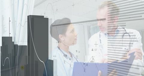 Doctors Analyzing Digital Healthcare Data on Tablet in Medical Office