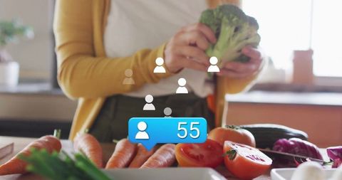 Woman cooking with viewed follower count overlaid feeling digital media influence