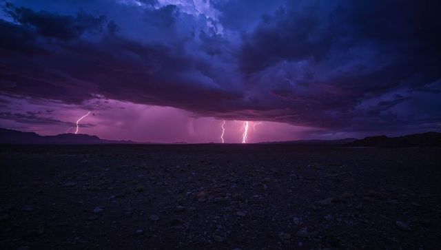 Lightning striking rocky desert at dusk under dramatic violet storm clouds