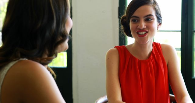 Women Having Friendly Conversation in Bright Room - Download Free Stock Images Pikwizard.com