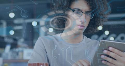 Tech Innovator Engaged in Coding with Futuristic Interface