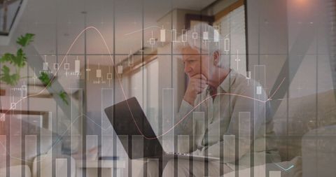 Senior woman analyzing finance data on laptop