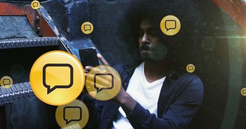 Man Using Smartphone with Social Media Icons Around