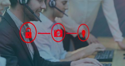 Diverse Support Team in Office with Digital Media Icons