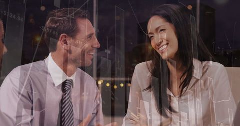 Business Professionals Discussing Analytics Report