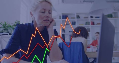 Businesswoman Analyzing Data with Futuristic Graphs