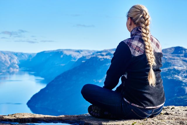 Blonde Female Hiking Alone with Stunning Fjord View - Download Free Stock Photos Pikwizard.com