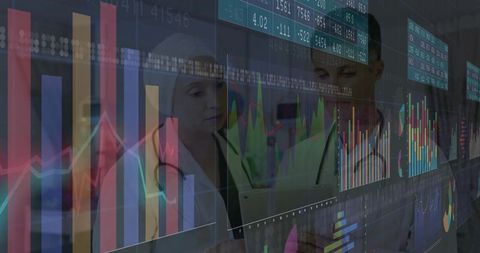 Medical Team Analyzing Data Charts in Hospital Corridor