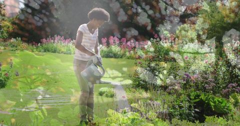 Gardening in Nature: Woman Tending to a Lush Garden - Download Free Stock Images Pikwizard.com